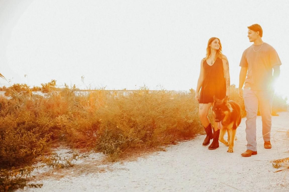 Jacob Soos and Chloe walking their dogs in Parrish, Florida