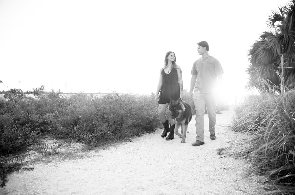 Jacob, Chloe and their dog walking together